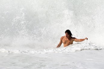 Crashing-waves-Bolivian-athlete-Rolo-Ismael-in-a-short-swim-Sicily-Italy-July-2011